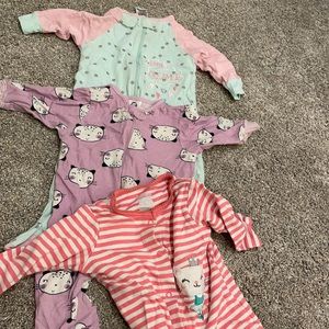Variety of footie onesies